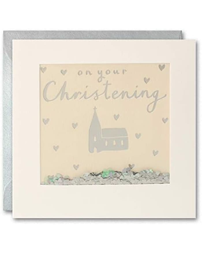 a white square card with a white frame with a church and hearts