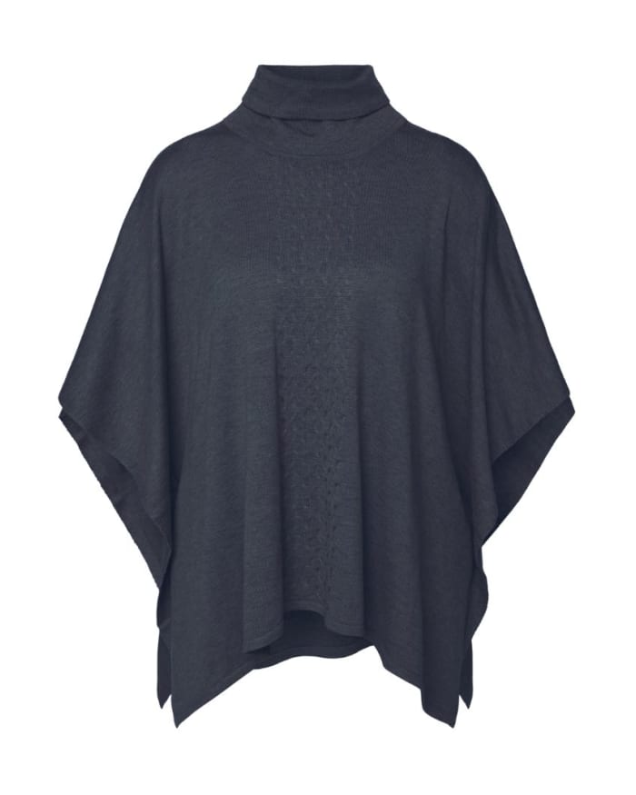 a black poncho on a mannequin