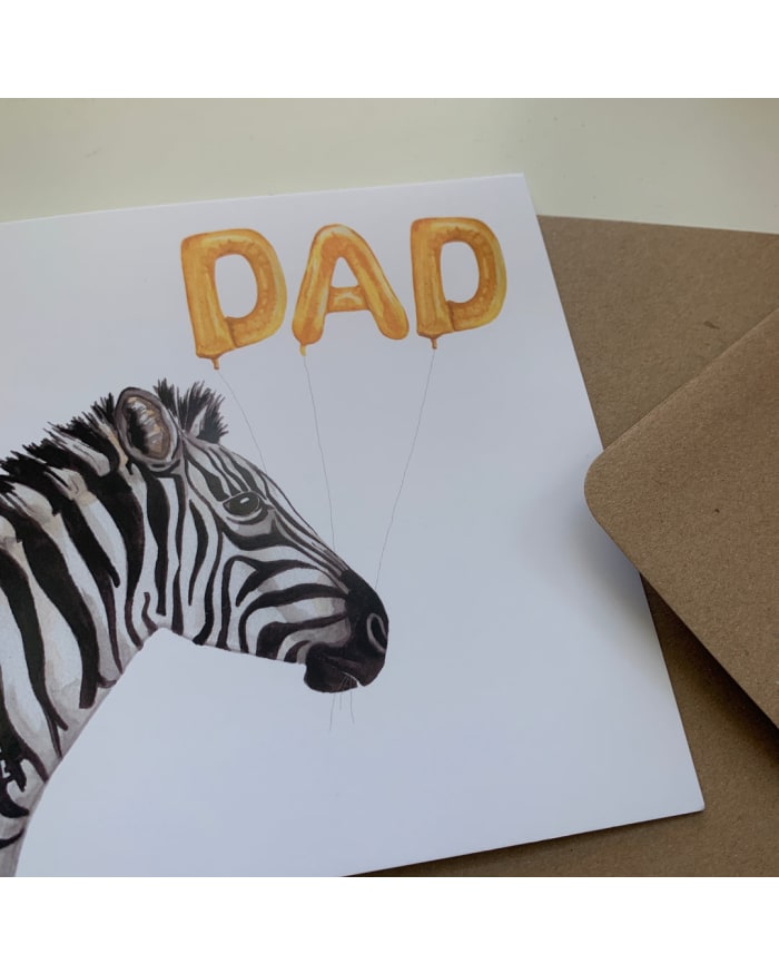 a card with a zebra and balloons on it