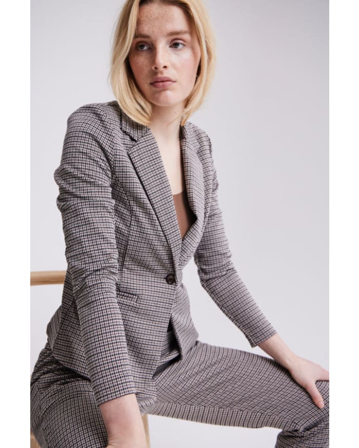 a woman in a suit