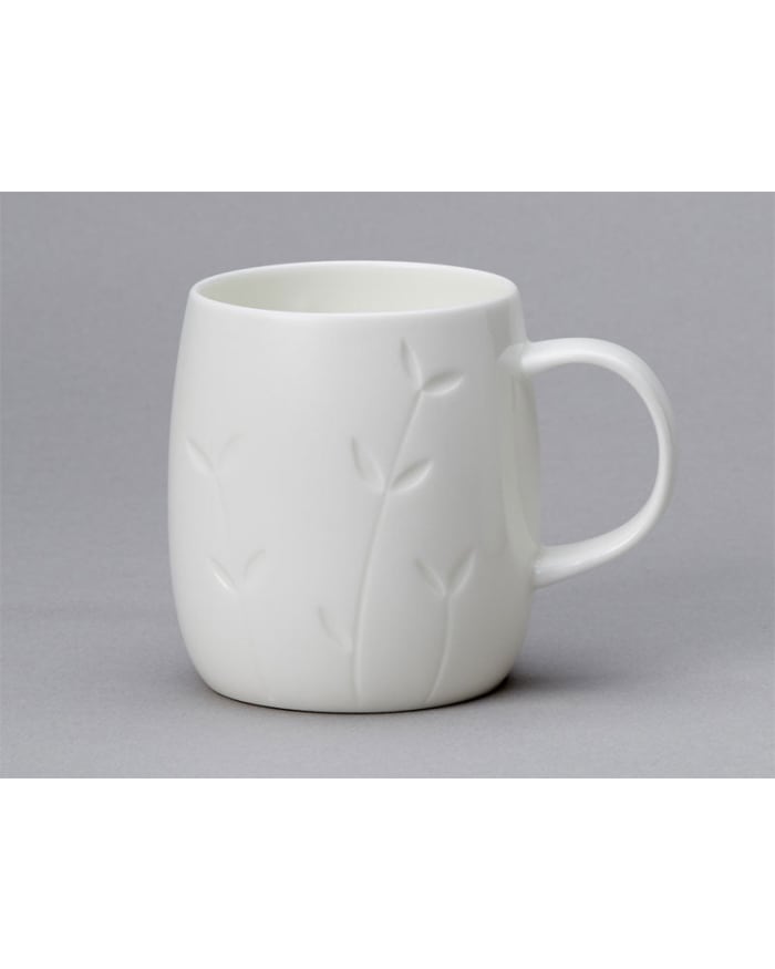 a white mug with a design on it