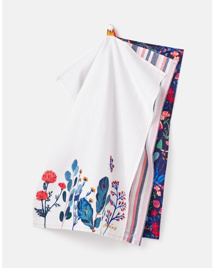 a white towel with a floral design on it