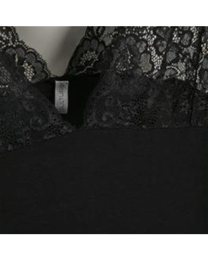 a black lace top with a white label