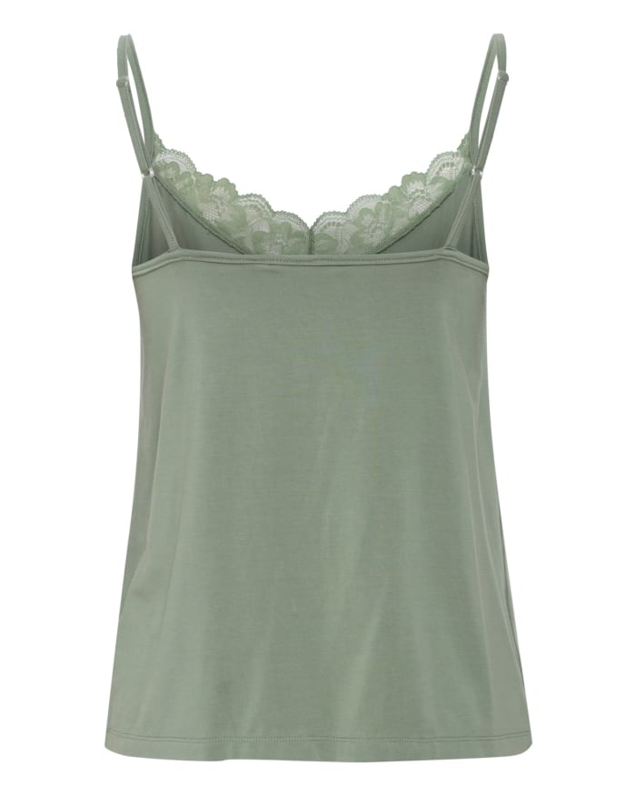 a green tank top with lace trim