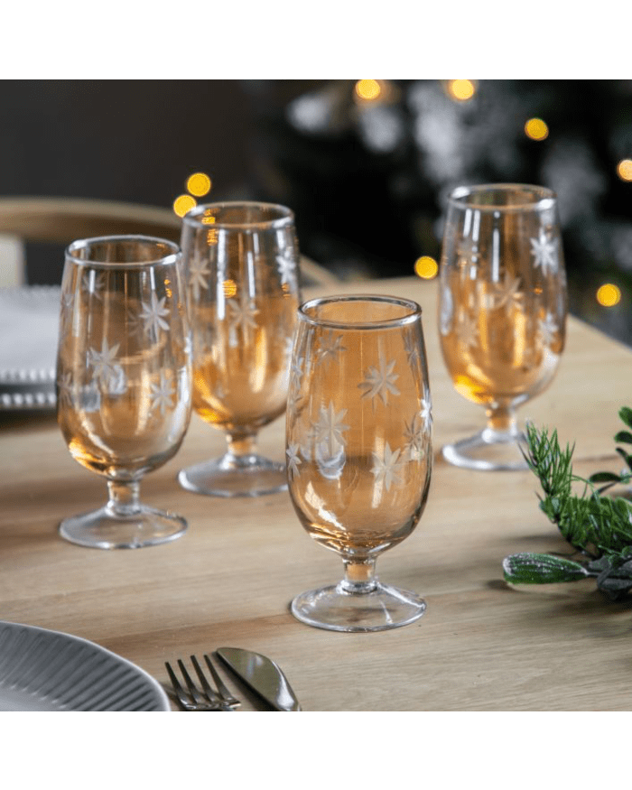 a group of glasses on a table