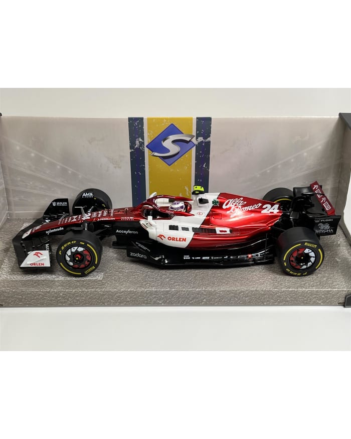 a red and white race car in a box