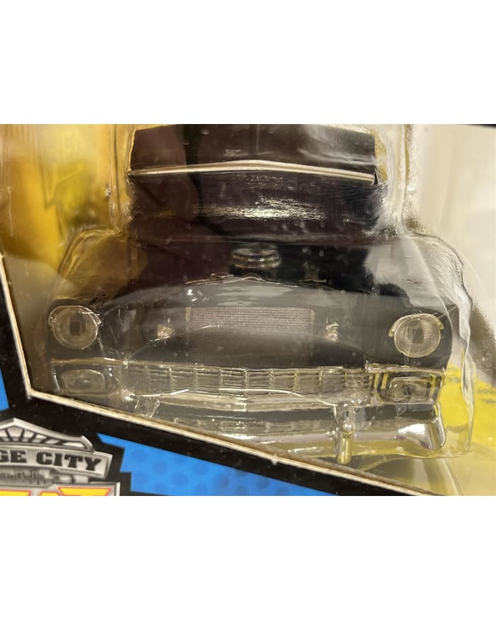 a toy car in a plastic package