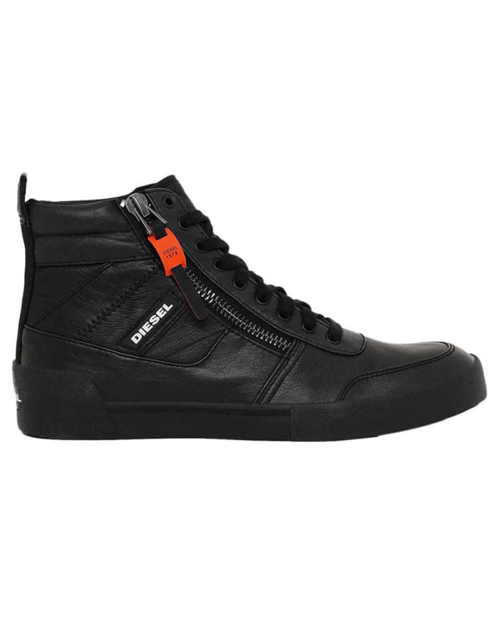 a black shoe with a zipper