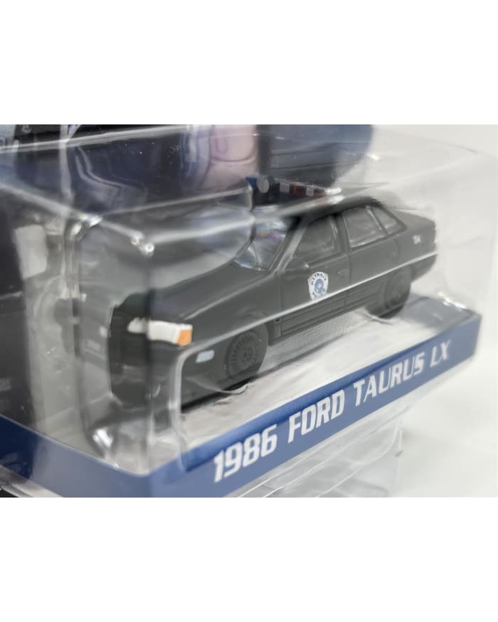 a toy car in a plastic package