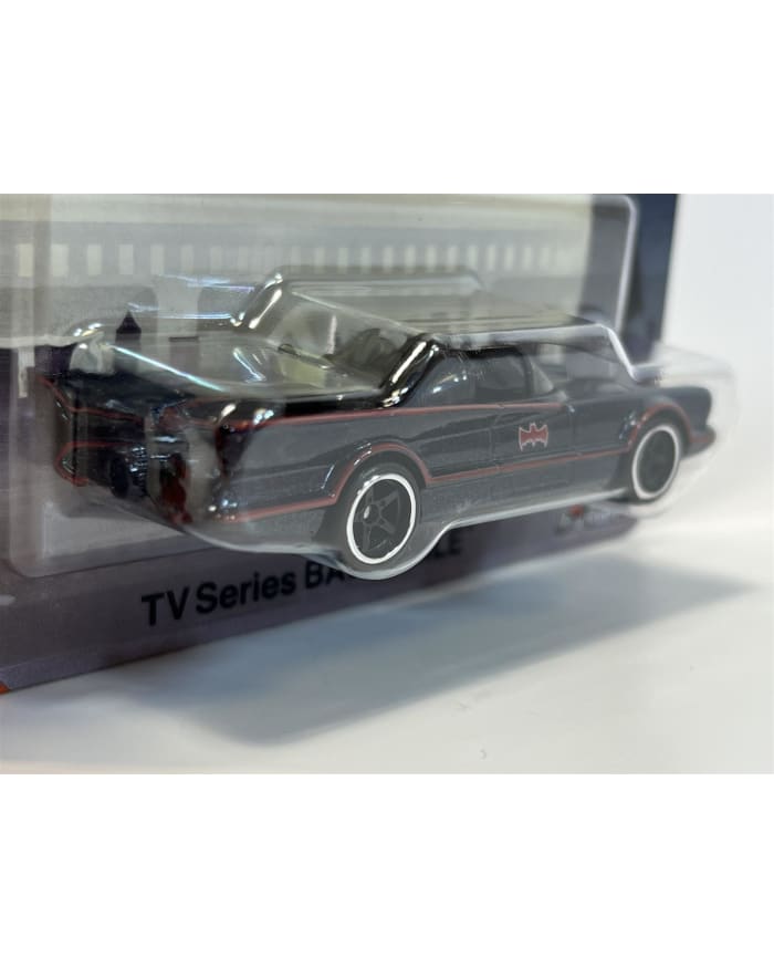 a toy car in a plastic package