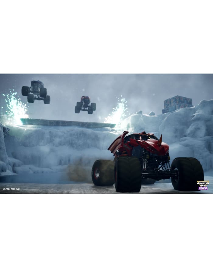 a red monster truck in the snow