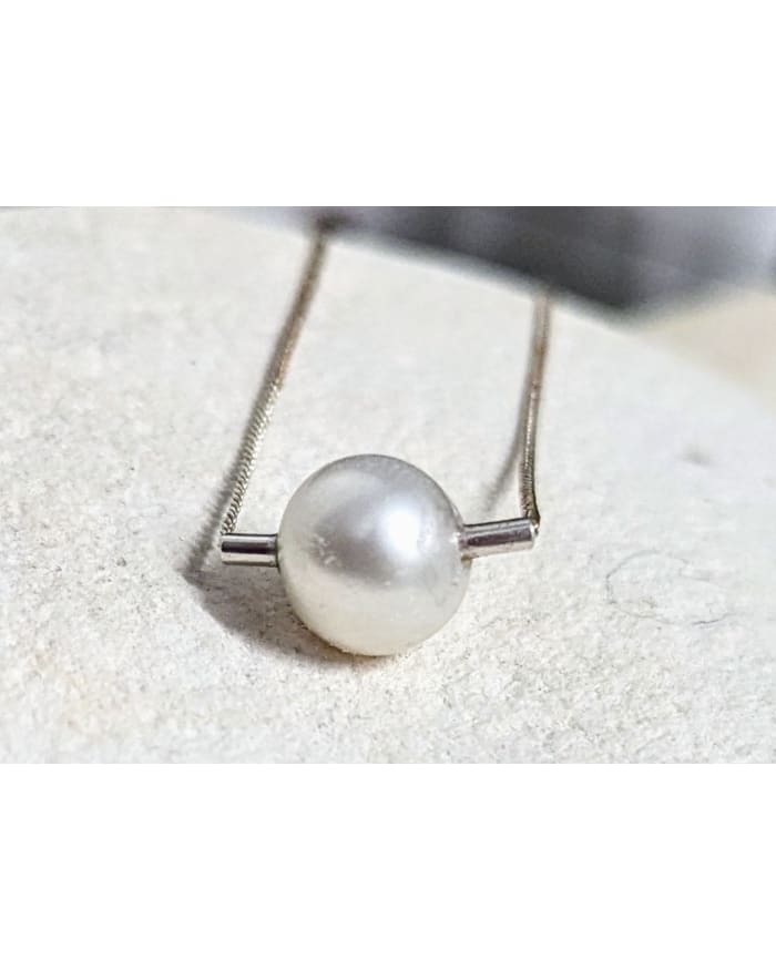 a pearl on a necklace