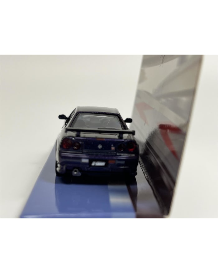 a toy car on a shelf