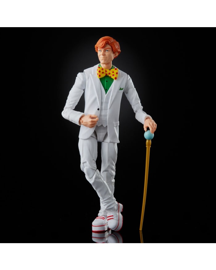 a toy figurine of a man in a white suit