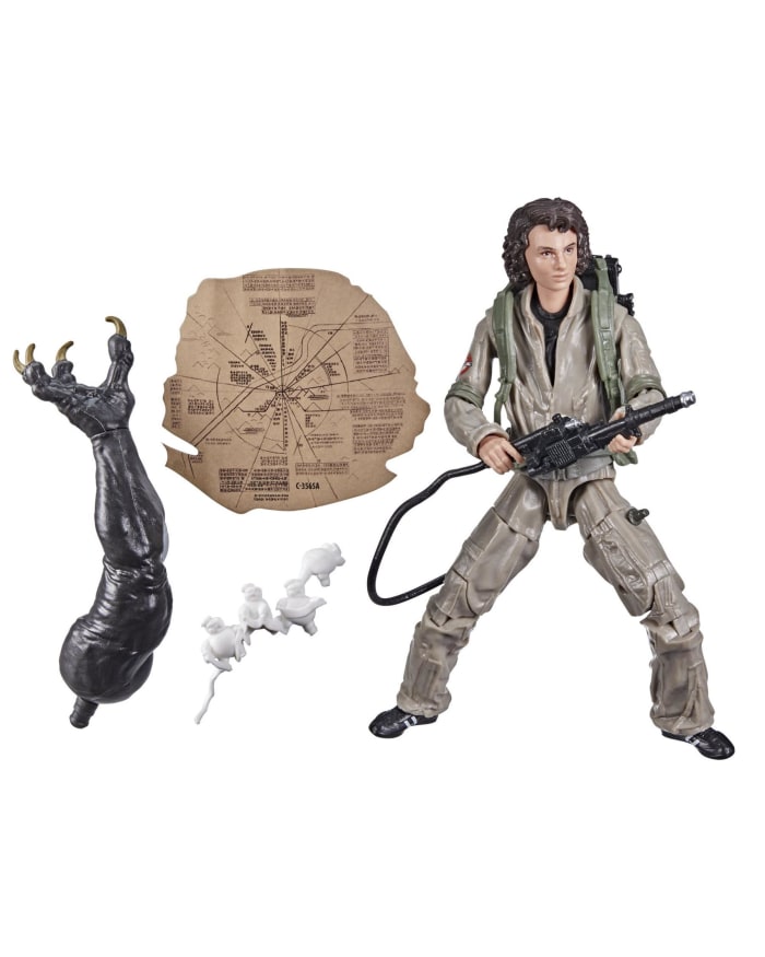 a toy figure with a gun and other toys
