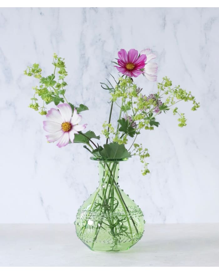 a vase with flowers in it