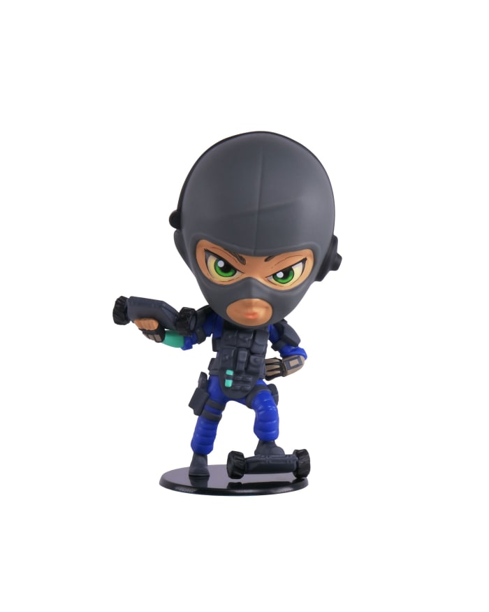 a toy figure with a black mask and blue bodysuit