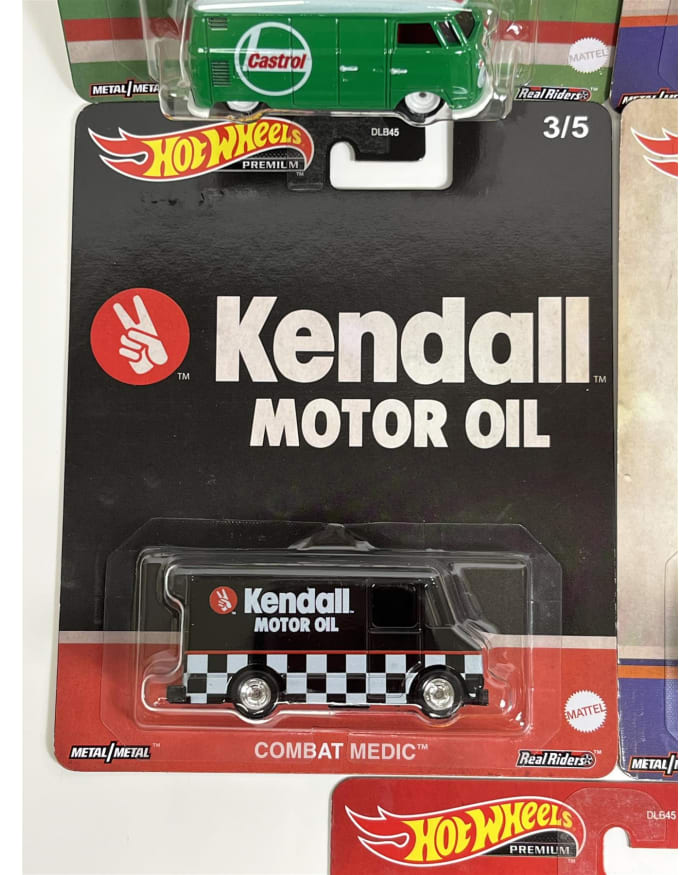 a black toy truck in a package