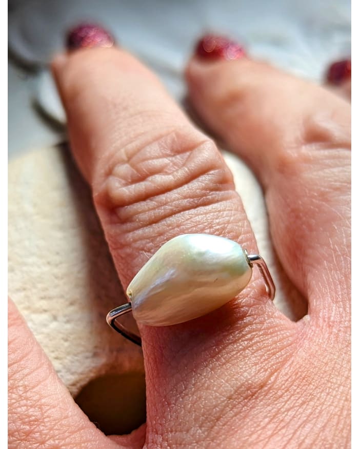 a close up of a ring on a hand