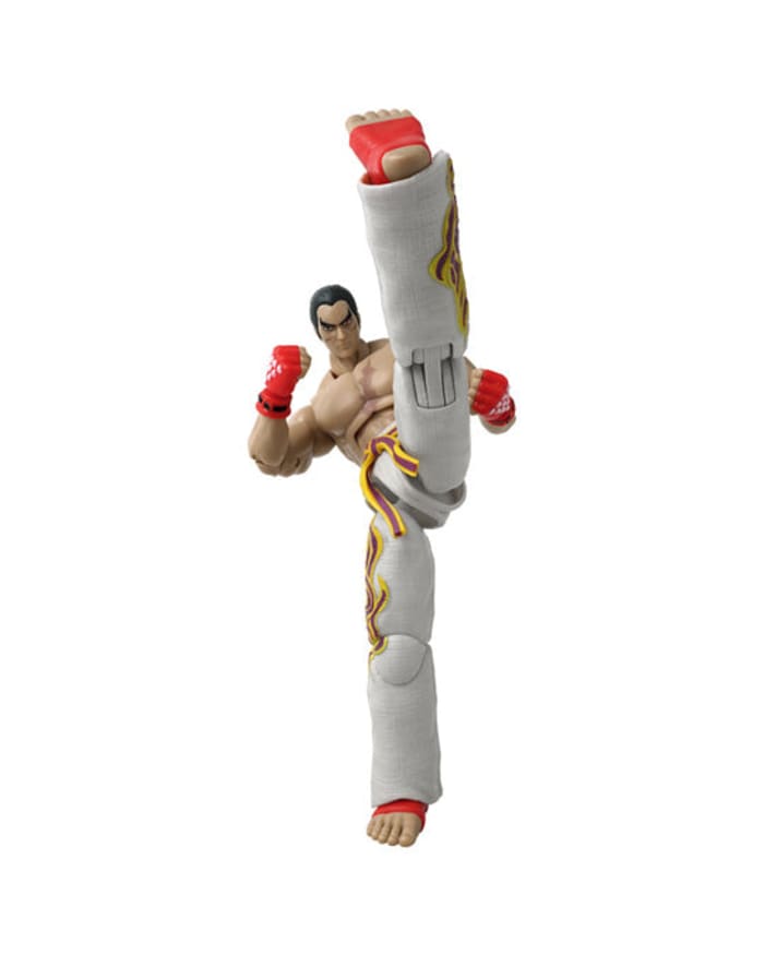 a toy figurine of a man kicking