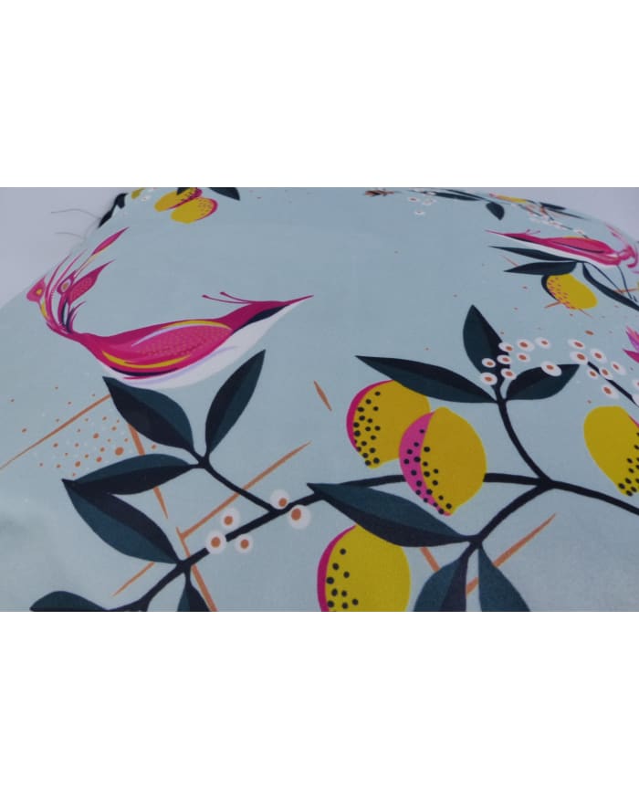 a colorful fabric with birds and flowers