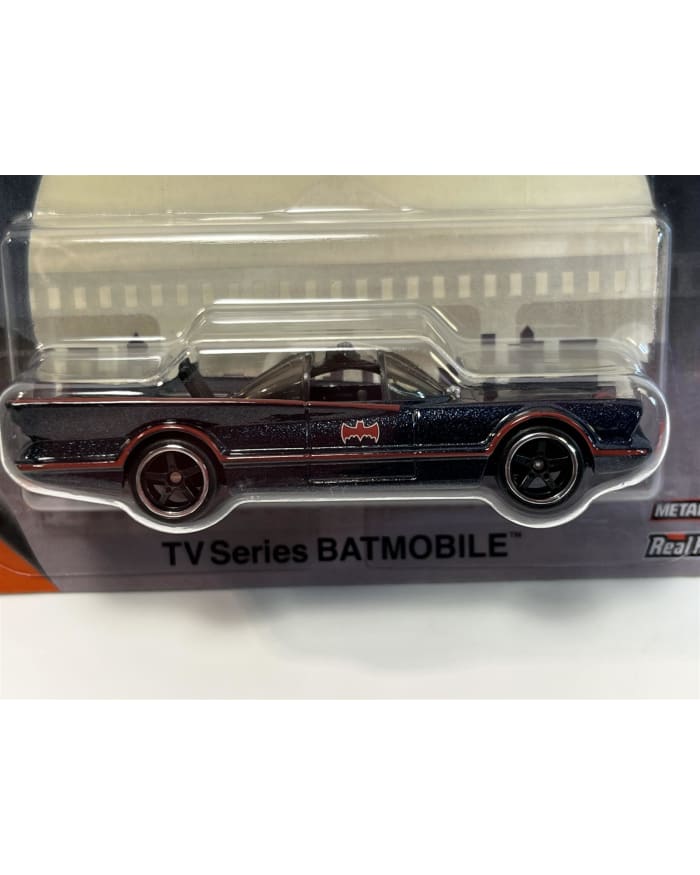 a toy car in a plastic package