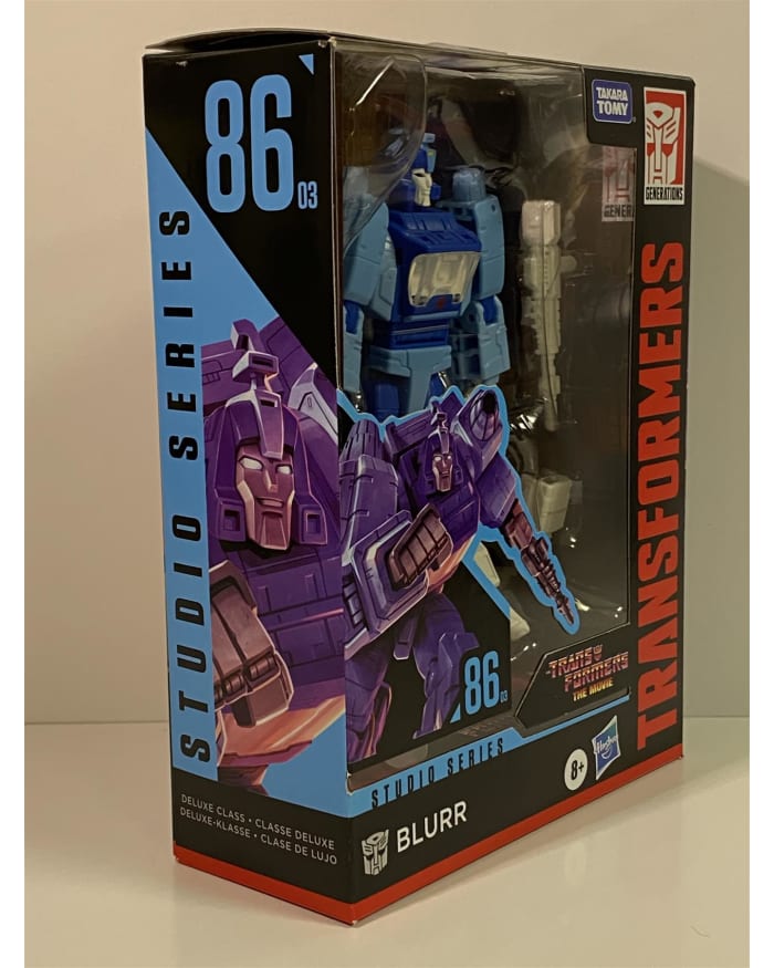 a toy box with a blue and purple action figure