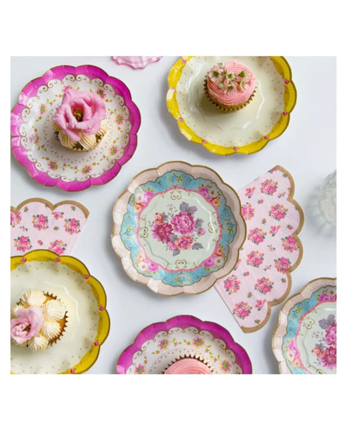 a group of plates with cupcakes on them