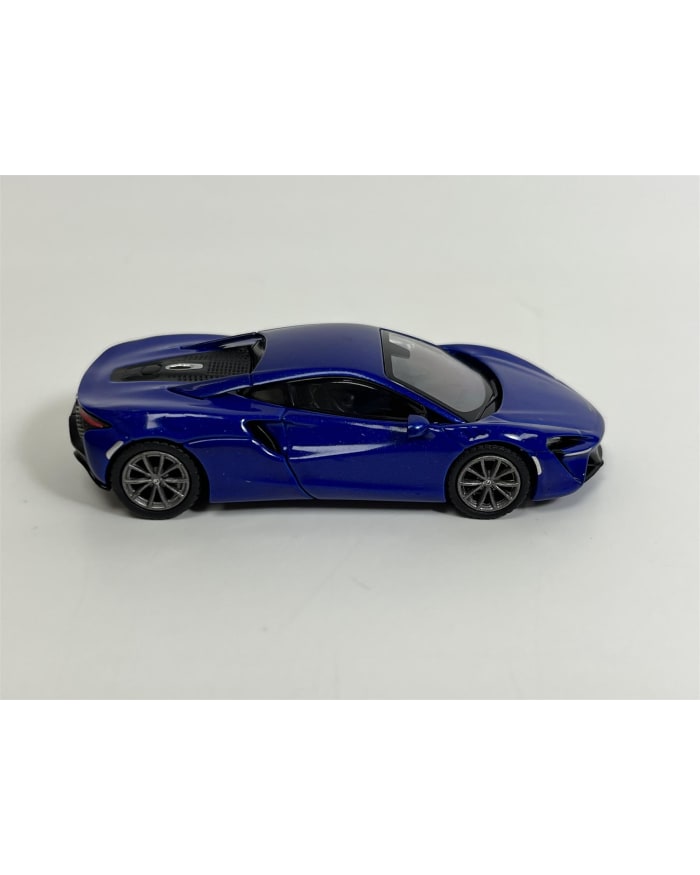 a blue toy car on a white background