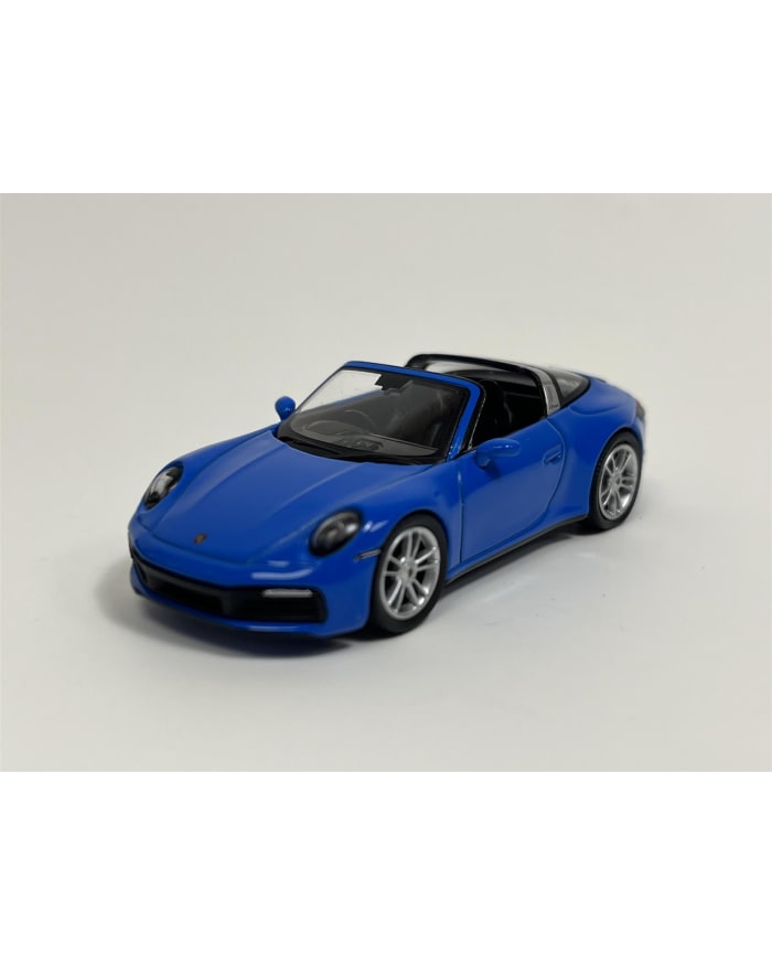 a blue toy car on a white background