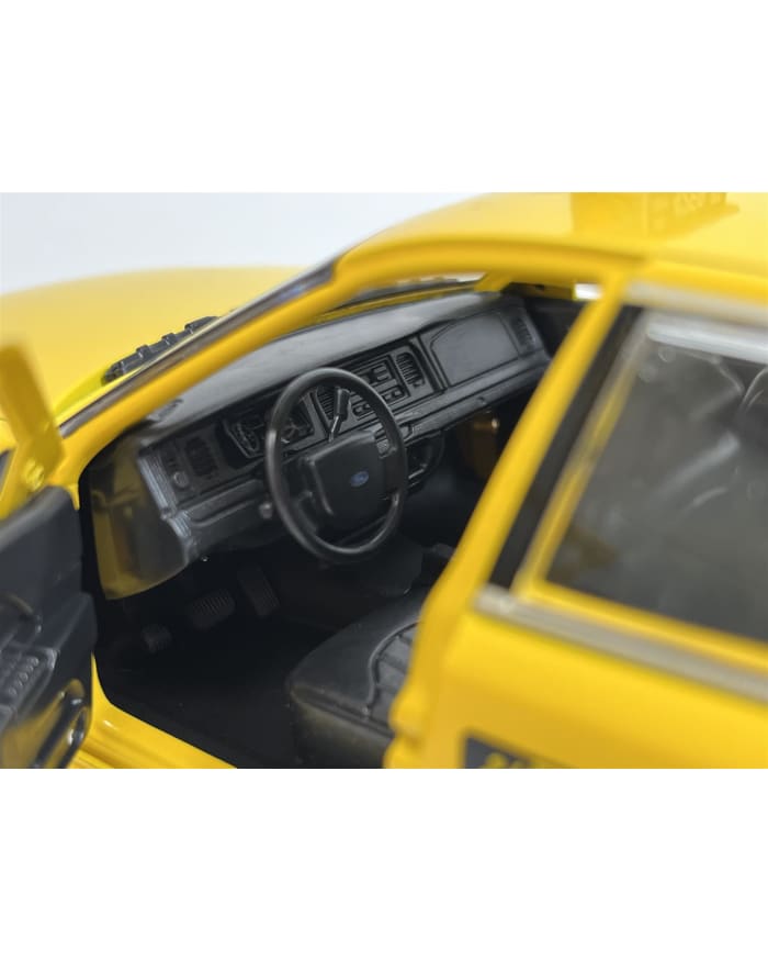 the interior of a yellow toy car