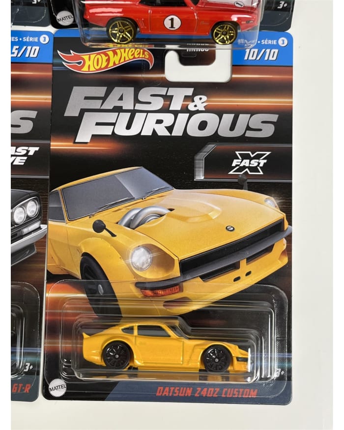 a yellow toy car in a package