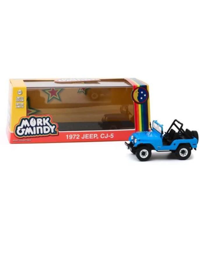 a blue toy car in a box