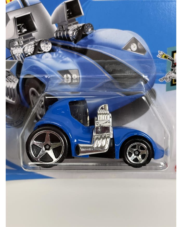 a blue toy car in a package