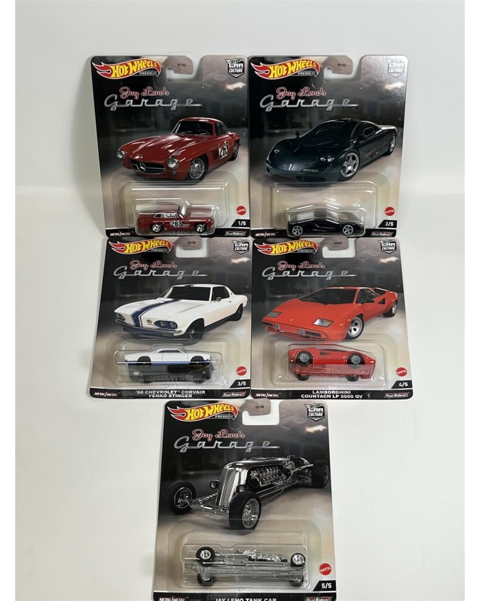 a group of hot wheels cars in packaging