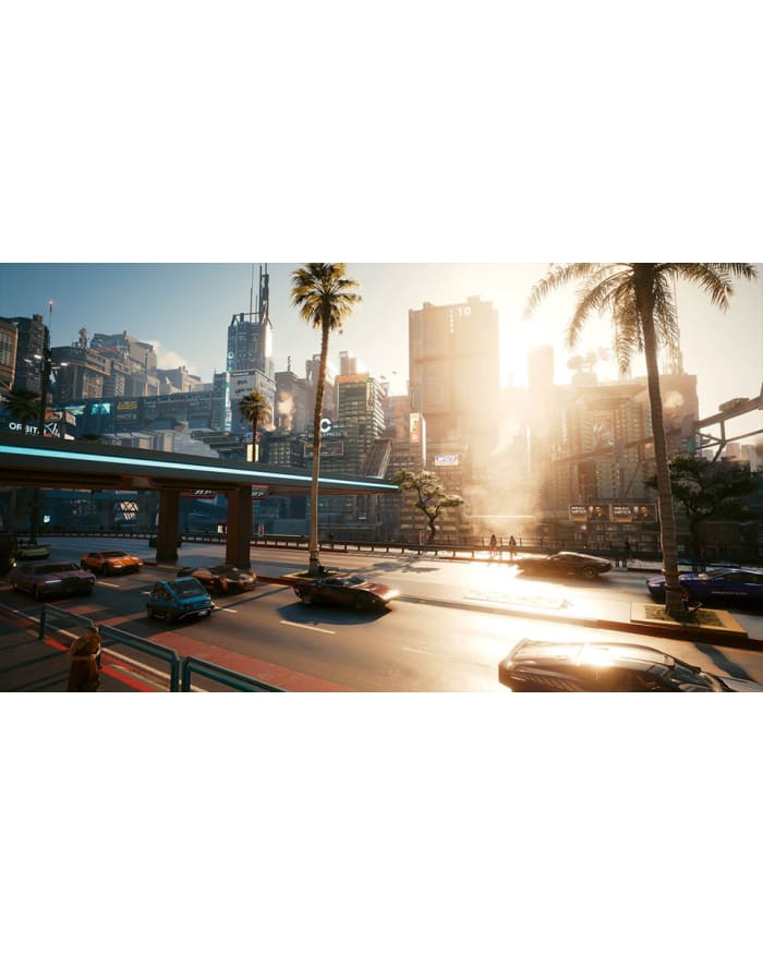 a road with cars and a building in the background