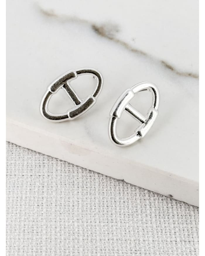 a pair of silver earrings