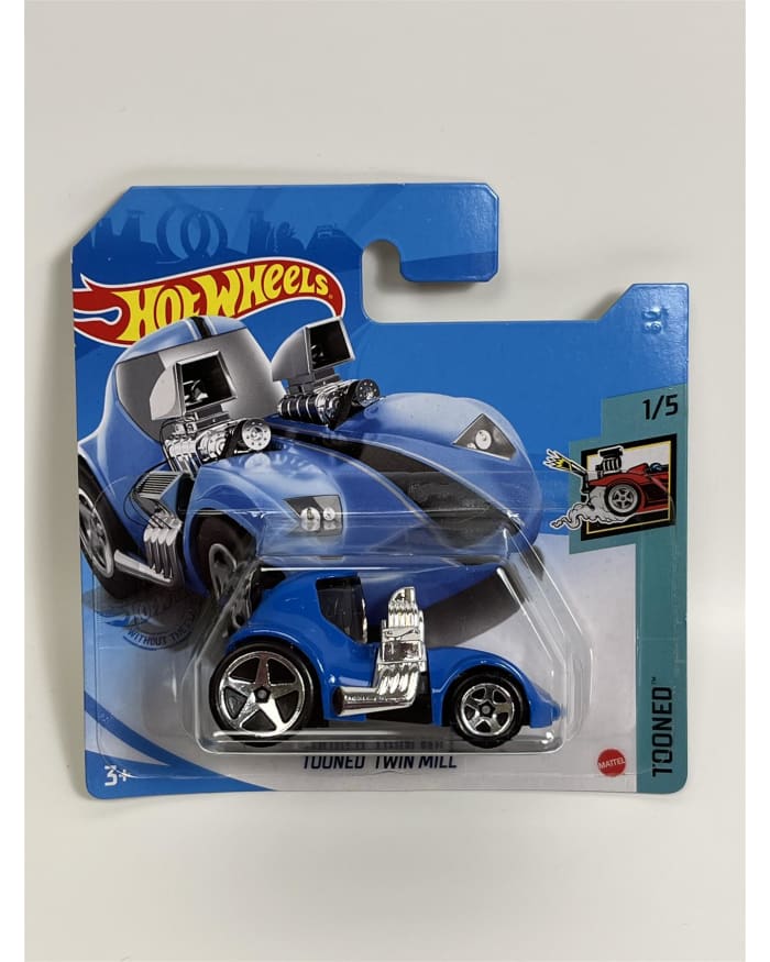 a blue toy car in a package