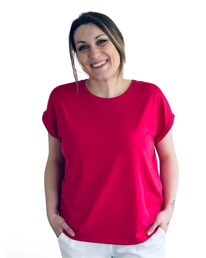 a woman in a red shirt