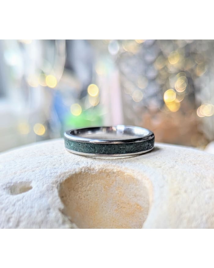 a ring on a stone surface