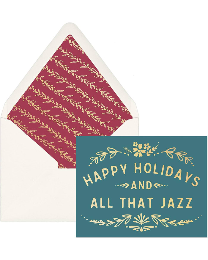 a red and gold envelope with a card