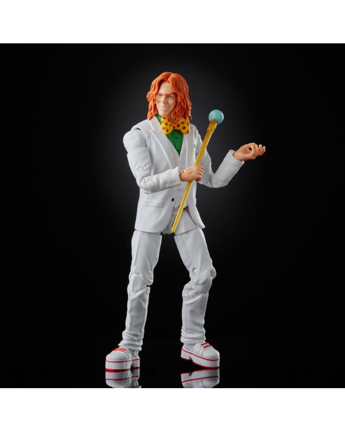 a toy figurine of a man with red hair and a microphone