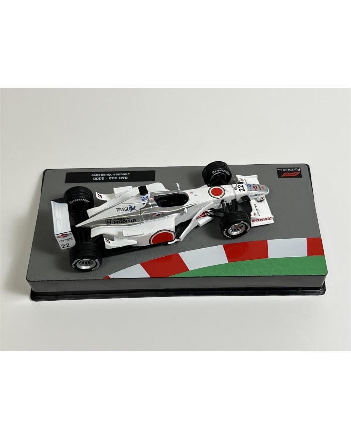 a toy race car on a box