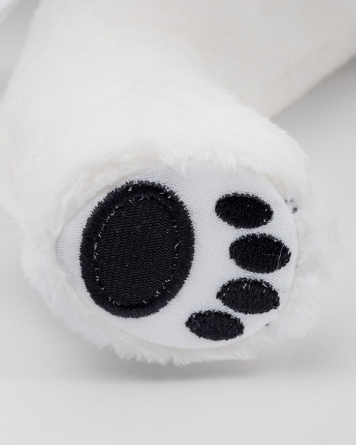 a close up of a stuffed animal paw