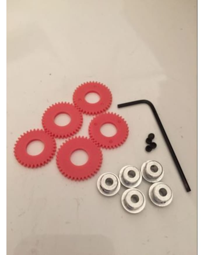 a group of gears and screws