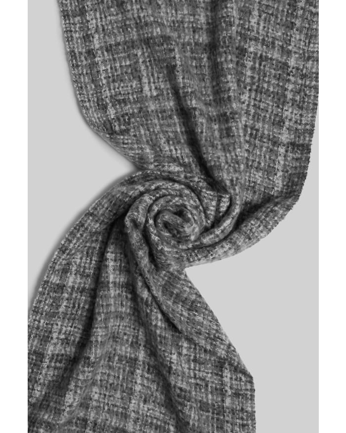 a grey scarf with a twist