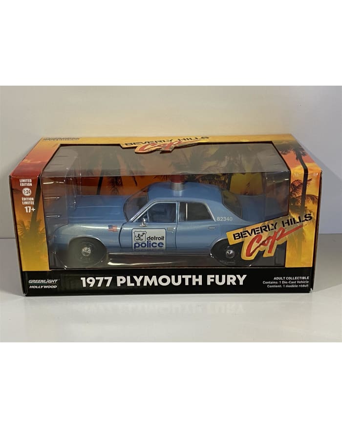 a blue toy car in a box