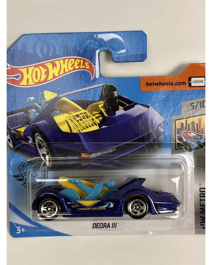 a blue toy car in a package