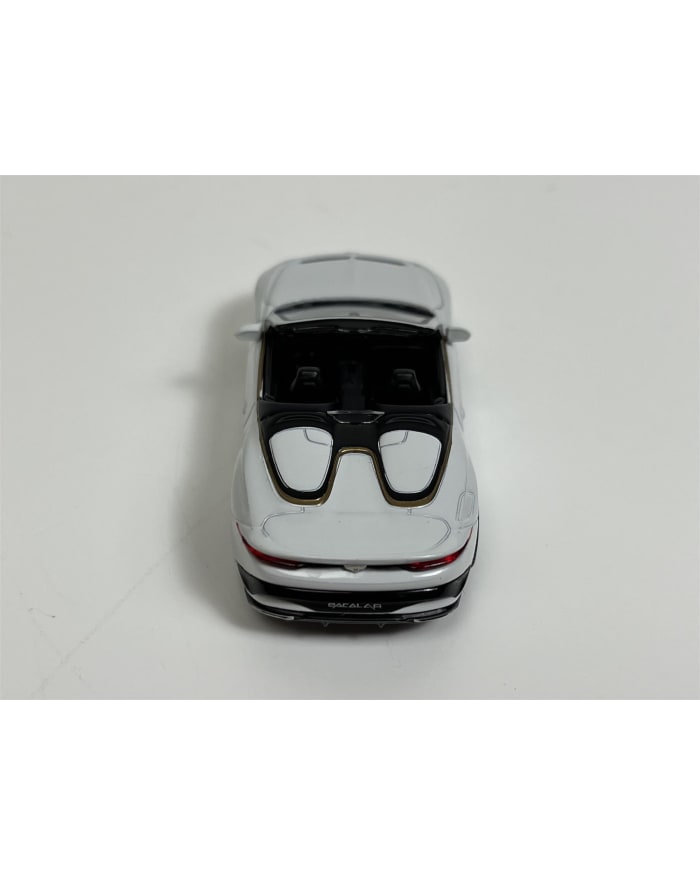 a toy car with glasses on top