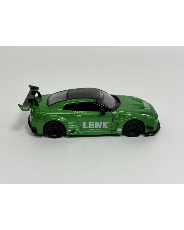 a green toy car with a spoiler